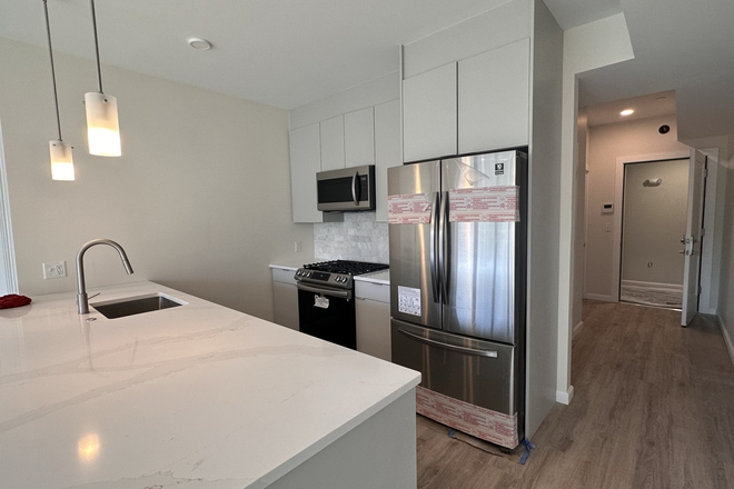 kitchen - Modern Brighton 1 bed with AC, in unit laundry, and parking - no fee! Apartments