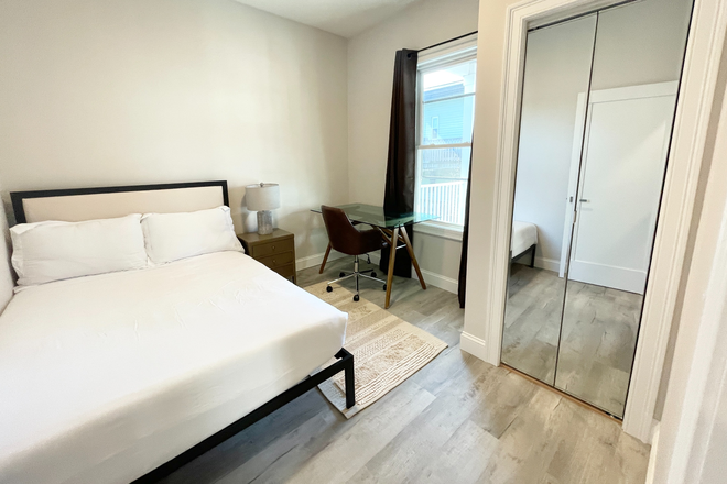Bedroom - Gorgeous newly renovated 5-bedroom, 2-bath apartment on Newport St in Dorchester.