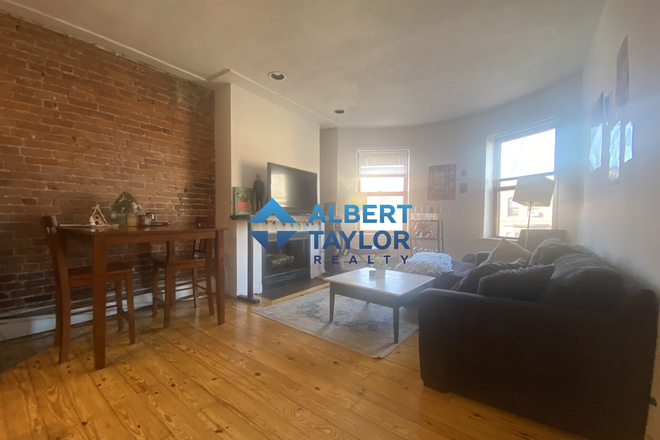 Living Room - Top-Floor 4 Bedroom on Columbus! Heat & Hot Water Included!! Apartments