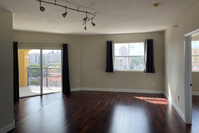 Living room and dinning area - Updated 2/2 close to campus and downtown Coral Gables Condo