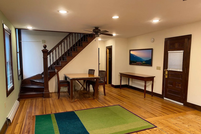 Living room (virtually staged) - Winooski Five Bedroom | $800/Bed | Near UVM & Burlington Duplex