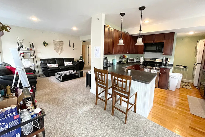 Kitchen and Living Room - Cornerstone Real Estate, Corner Apt close to Green Line and Hillside Market