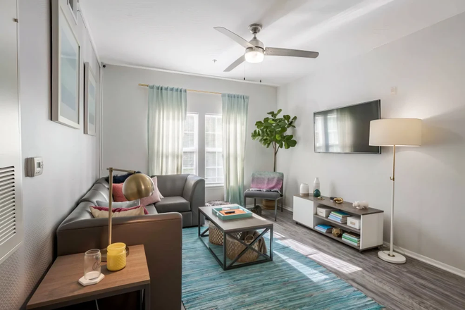Modern Living Room Image - $300 Bonus Upon Signing - Sublease at Orion on Orpington Apartments