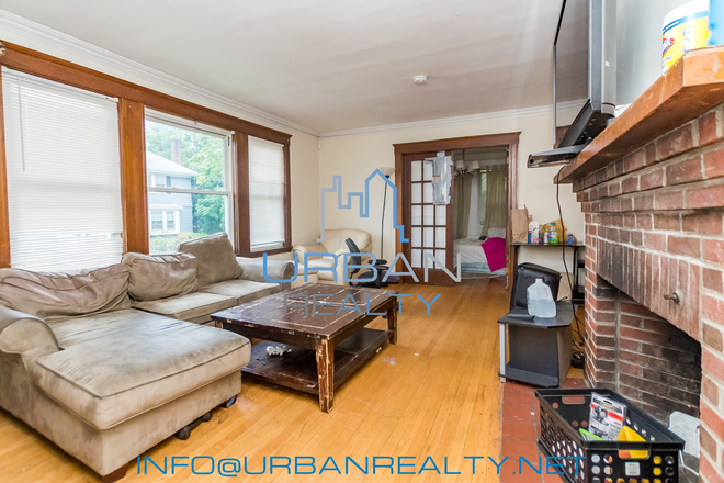 LIVING ROOM - *** NOW RENTING 2026-2027*** LARGE 6 BED 2 BATH DUPLEX ON GERALD RD Apartments