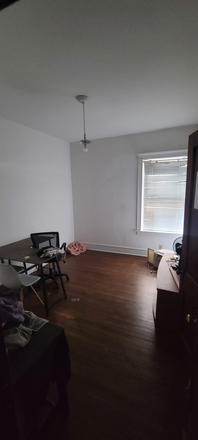 This is the upstairs room with a large deep closet, has some stuff from a previous roommate that we are getting rid of - large 2 first floor and basement apartment near the redline