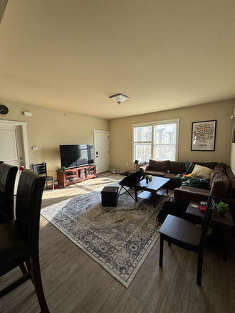 Living Room - The Lodges of East Lansing Apartments