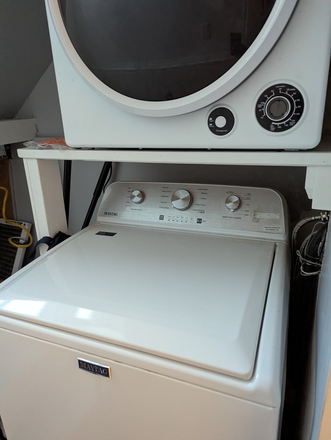 Laundry nook - Furnished Basement Studio Apartment with laundry