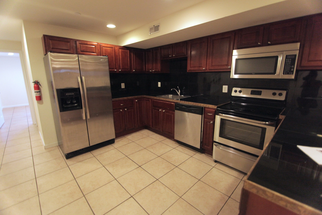 Kitchen - OCP - 5 Bed 3 Bath Unit On Best Off Campus Block Apartments