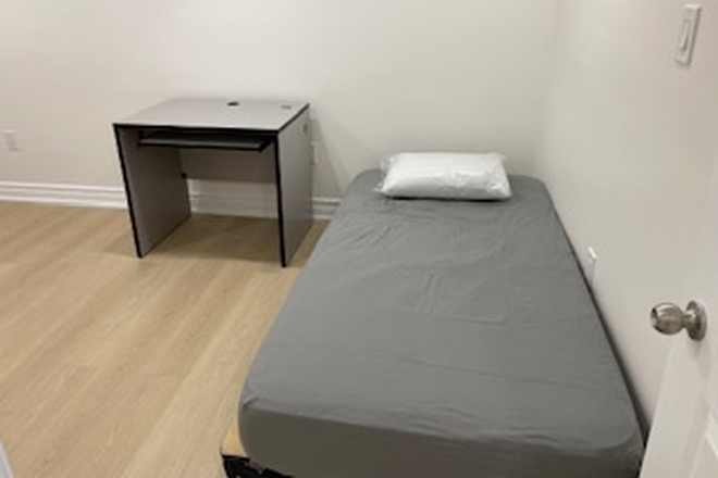 Shared room bed 1 - 2 Private rooms and 1 Shared room in a 3 bedroom basement.