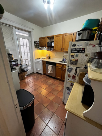 Kitchen with dishwasher and porch - AVAILABLE 11/1 Cleveland Circle, Heat & Hot Water Included, Easy Access to B, C, and D Line T Apartments