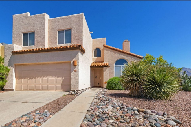 Outside street view - Riverwalk/Bike Loop House. Stunning Mt. views! 3 Bed, 3 bath, sparkling prvt. Commty pool. Near all!