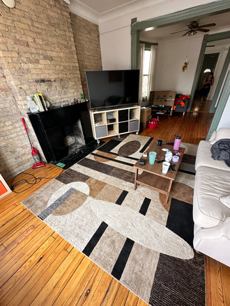 Living Room - NEED 1 ROOMATE Spacious, 4 bed 2 ba apartment right by campus, great lighting, high ceilings, patio