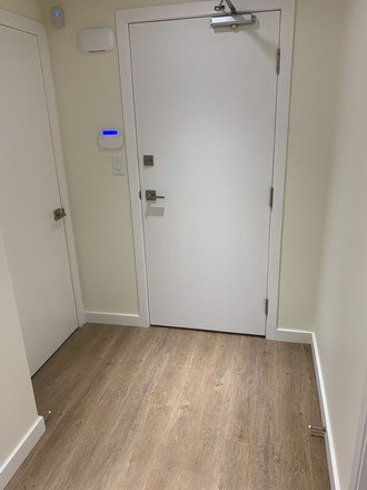 Inside unit entrance hallway - Rec renovated bsmt apt/1 bdrm+work area/4 pc bath/full kitch/shared laund + yard/sep. ent/1 car prk