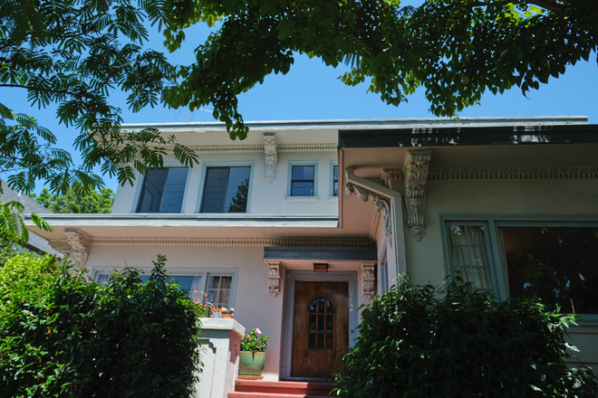 Street view of 2739 Stuart St. The rental unit occupies the top floor - Spacious Upstairs Flat in Elmwood