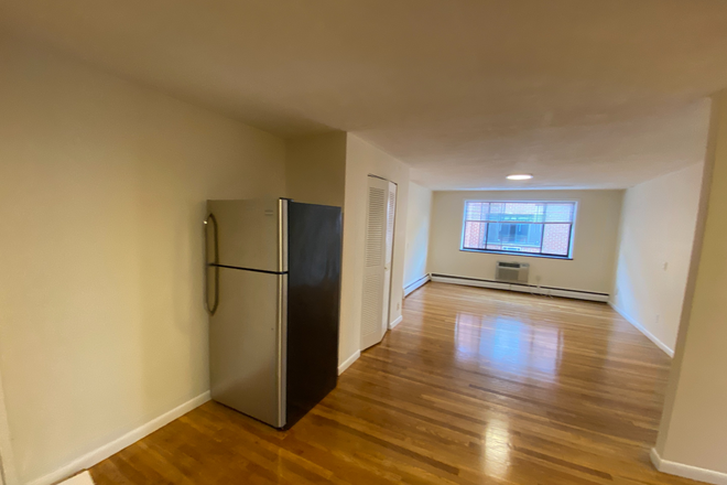 Living room - ONE MONTH FREE RENT! Renovated 2 bed near BU with nice kitchen, AC dishwasher, No fee, HT/HW incl Apartments