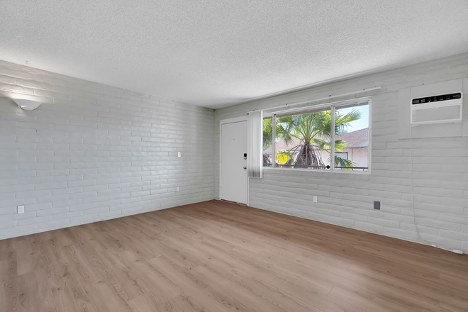 New flooring and paint. - Private Studio Apartment Available Now - Walk to U of A!