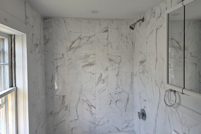 Newly renovated bathroom - Conveniently located to the bus line, train station. Off street parking and close to shopping center Apartments
