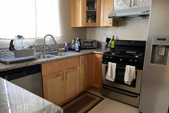Full size fridge and gas stove monthly cleaning included - Fully furnished Private Room w/ Own bathroom and Garage Parking laundry All Utilities Included Townhome