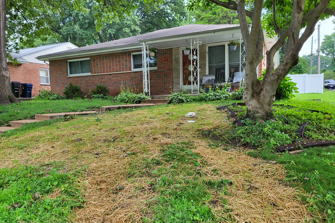 Front of house. - Furnished basement apartment with kitchenette