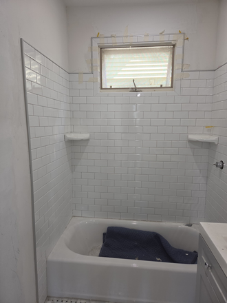 Newly updated Bathroom - COZY 3BR UNIT WITH LIVING ROOM, EAT IN KITCHEN AND LAUNDRY Apartments