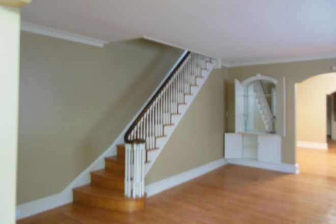 Living room w/stairs to 2nd floor - Stunning Student/Faculty House Rental