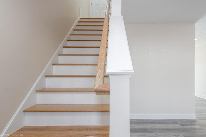 Staircase - A full room with an attached bathroom for rent in a Christiansburg townhouse