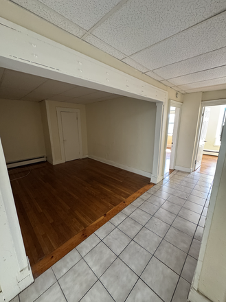 Call NOW for showings! 617-236-8600 - HARVARD ST - LRG & MODERN TOP FLR 2BR/1BA *AVAIL NOW* IN THE PORT W/ LNDRY ON SITE, EIK, OFFICE! Apartments