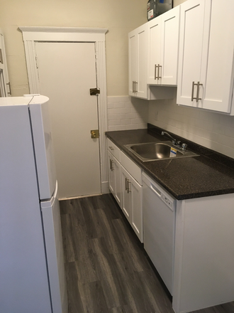 visit hubrealtyproperties.com - Brighton, large studio with renovated kitchen, on Green line T