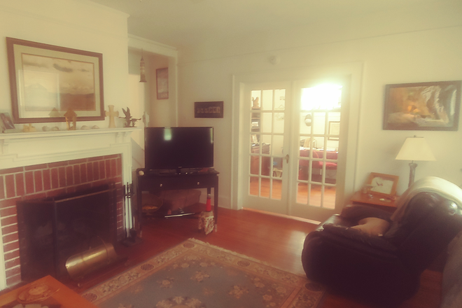 One view of front living room. - Spacious excellent location adjacent to downtown, 6 minutes away. House