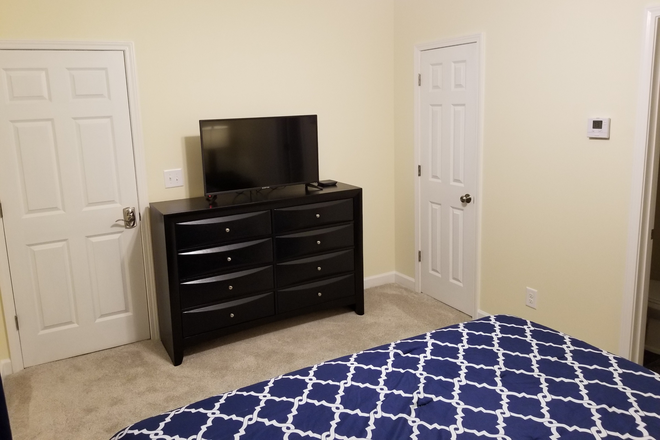 TV Dresser view (some have a chest) - King Bed Fully Furnished w/ Ensuite Bathroom Includes utilities and cleaning House