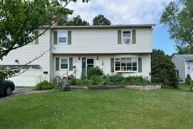 Front view of home, bedrooms on second floor - Residential Neighborhood House