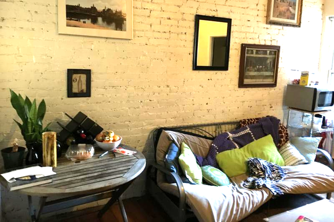 Visit hubrealtyproperties.com - Mission Hill, sunny front facing 1 bedroom, on the green line T Apartments