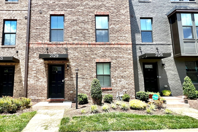 Front of house street view - New Townhouse with EV Charging, Mins from Campus & Downtown