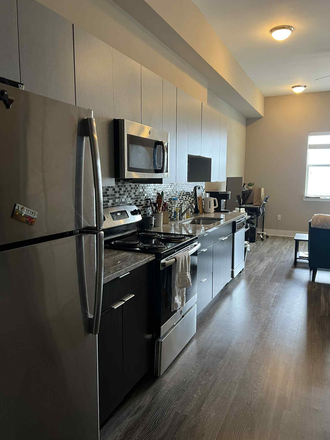 Large kitchen - Yugo Apex College Station Apartments
