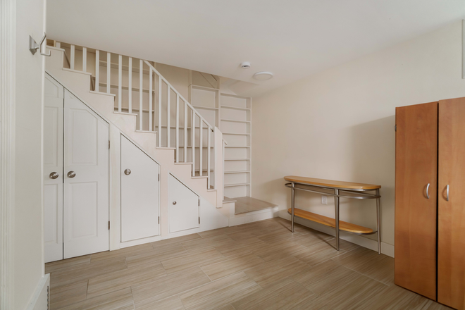 Stairs to lower level bedroom - 55 Waterhouse, Somerville