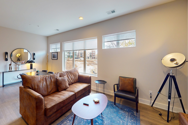 Spacious living room - 119 Mason Ave Unit 206 Apartments