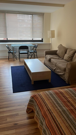 living room - Fully Furnished Studio with all utilities, cable and internet. Walk to Rosslyn Metro!