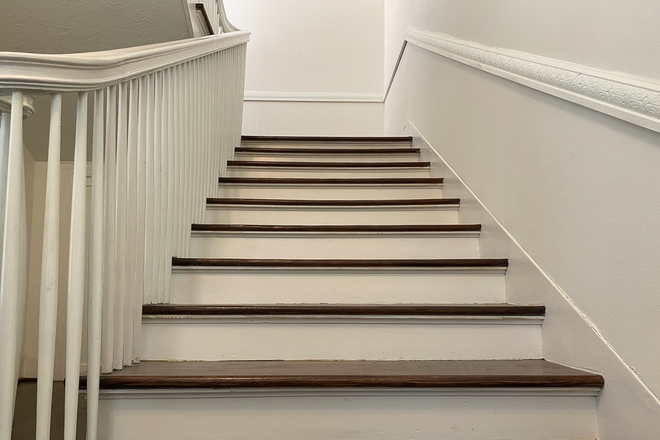 Another view of stairway - Large two-bedroom house (duplex split); Short bike/walk to campus