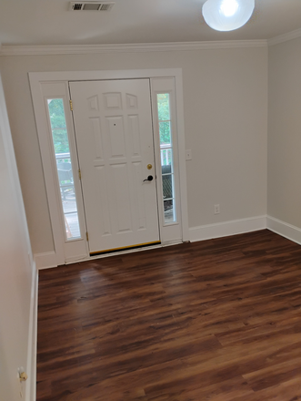 Apartment entrance into eating/kitchen area - Spacious 1-BR Above-Ground Basement Apartment with Private Entrance & Deck in Morningside