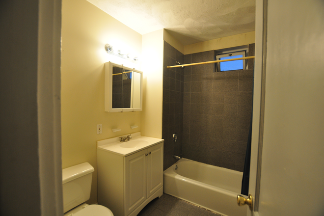 Full Bathroom - Short & Long Term apartments for rent in the heart of Allston!