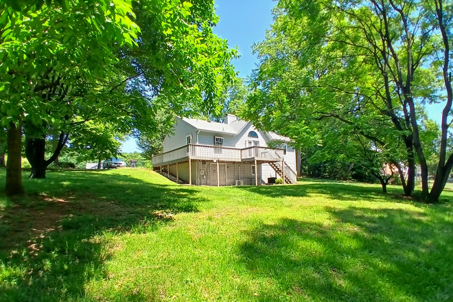 Backyard - 2bed, 1bath w/ double vanity, in unit laundry, kitchenette, walking trails