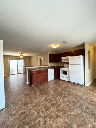 Spacious Kitchens - University Terrace (105 E State St) Apartments
