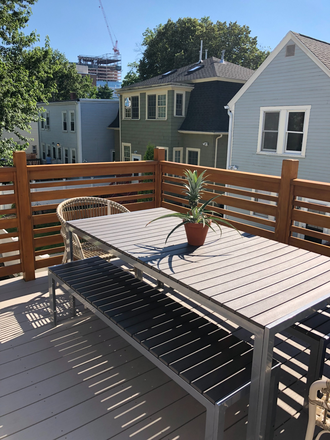 Dining area on private deck - Fully furnished and equipped condo close to campus with large private deck available July/August