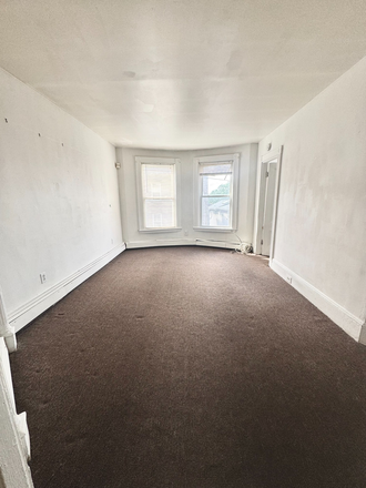 Living room - Sun filled 3 bed apartment avail. on Parker Hill Ave. in Mission Hill!