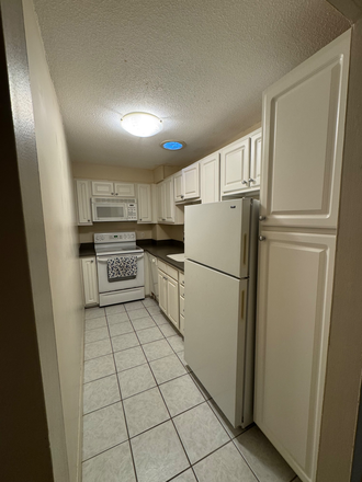 Kitchen - Spacious, sunny 1br/1ba apartment with OFF-STREET parking near Harvard - Available 8/15!
