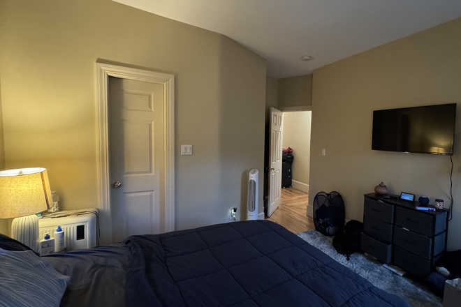Bedroom with bathroom door visible - 19 Burney St Townhome