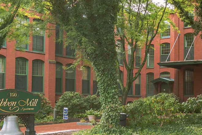 outdoor entrance - Ribbon Mills Apartments