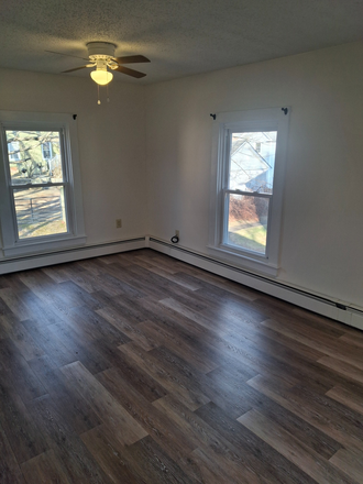 Living Room - Easy 20 Minute Commute! HEAT & HOT WATER INCLUDED!