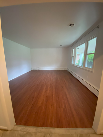 1st floor living room - Beautiful 5-Bedroom Single Family Home Near UMD – Available for Rent Aug 1st, 2025