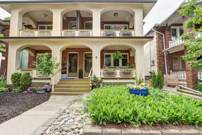 Front of house - unit is upper floor - 2 Bedroom 1 Bathroom steps from the beach with parking Triplex
